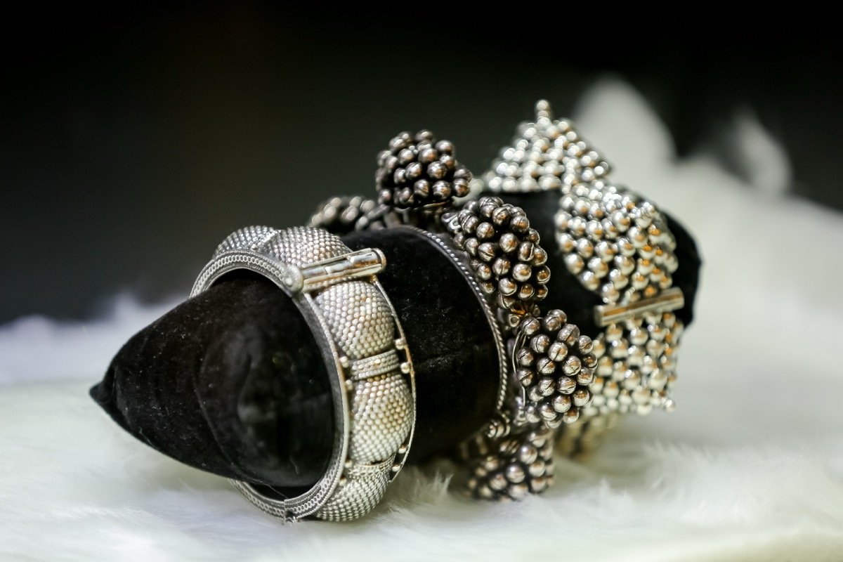 silver anklets and bangles traditional Indian jewelry, elegant display, professional photography